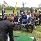 Son Mark placing Urn