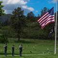 The Honor Guard cocks the rifles and fires one of three volleys honoring Leo and his service to country.