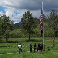 Leo's family at the cemetery's flag for some photos.